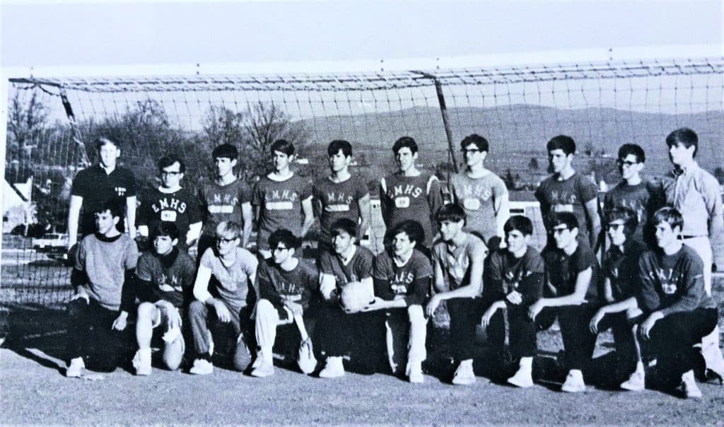 Coach Ron Koppenhaver and the
1967-68 team.